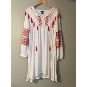 White dress with aztec-inspired embroidery